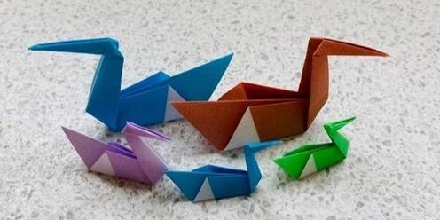 Emelia makes origami - School Holiday Program 